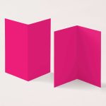 Two bright pink folded greeting cards standing upright on light background, ready for invitations or notes.