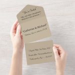 Hand holding blank unfolded wedding invitation card ready for custom design, ideal for elegant wedding submissions.